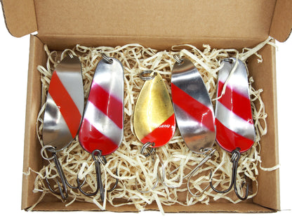 back side of fishing spoons striped red and white